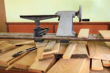 A machine in a carpenter's workshop. Background with selective focus and copy space