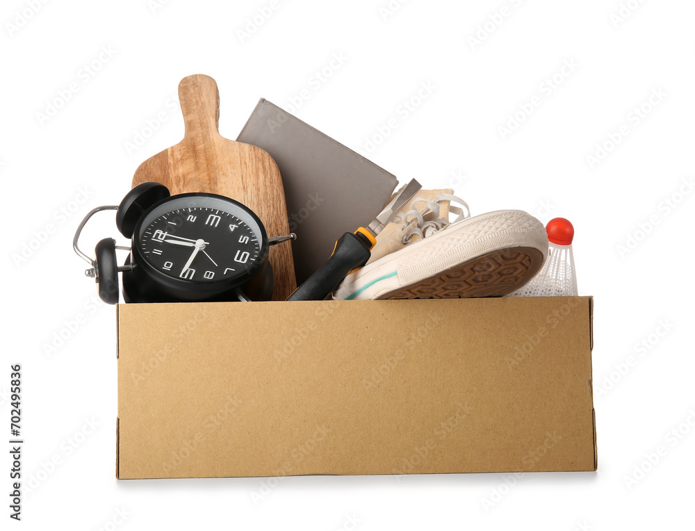 Wall mural Box of unwanted stuff for yard sale isolated on white background