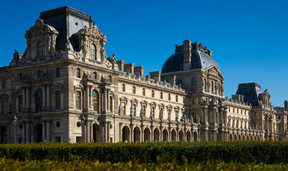 Fototapeta na wymiar View of impressive building of Louvre Palace on sunny autumn day..