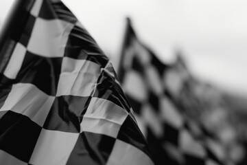A black and white photo of a checkered flag. Suitable for use in sports-related projects