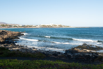 Sunny Coastal View with Clear Blue Waters