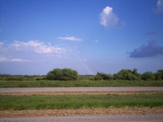 Obraz premium a baby rainbow on the horizon