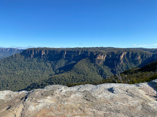 Spectacular views from a mountain-top lookout. Blue mountains, Australia, NSW. Beautiful rock formation. White stone at the summit.