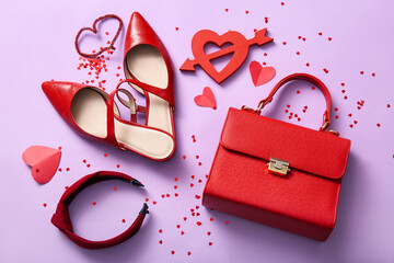 Composition with stylish female shoes, accessories and decor for Valentine's Day celebration on color background