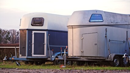 Horse Trailers Parked on Open Field Horse Race Track during Tournament Season