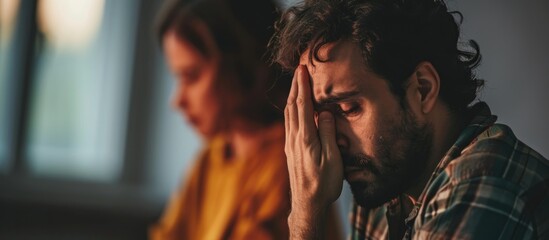 Man receiving therapy for depression and mental health issues, crying with psychologist's support. - obrazy, fototapety, plakaty