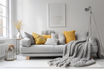 Modern living room interior design with soft pillows and yellow plaid on comfortable grey sofa. Interior in minimal style with empty space for products presentation or text for advertising