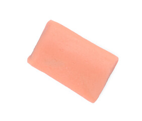 Orange chewy candy with liquorice isolated on white, top view