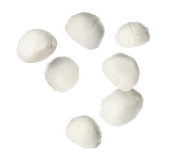 Fresh mozzarella balls falling on white background