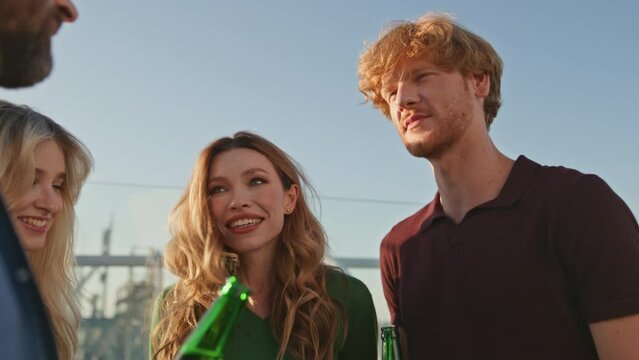 Happy People Enjoy Hang Out On Sunny Rooftop Close Up. Diverse Smiling Friends