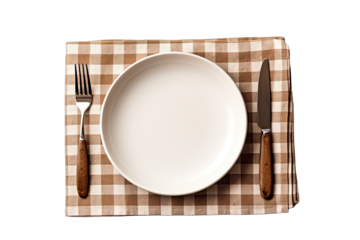 Table setting. Empty plate knife fork and napkin