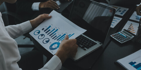 Business team meeting present, investor colleagues consultation and conference new strategy plan business and market growth on financial document graph report, Meeting and Talking.