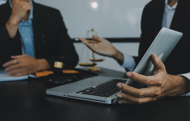 Group of experienced attorneys and lawyers giving consultation to client, helping with difficult lawsuit, explaining legal procedures and discussing agreement terms. Law services and support concept