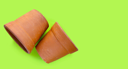 Plant pots on green background.