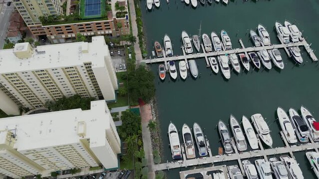 Aerial View of Yacht Club and Marina in Miami beach. Boat on Venetian Marina. Yacht at the Miami International Boat Show.