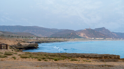 Fototapeta na wymiar Al Mughsayl Beach (also written as Al Mughsail Beach)