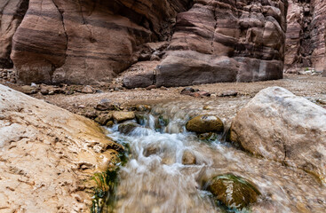Small  rapids along shallow stream along the Wadi Numeira hiking trail in Jordan