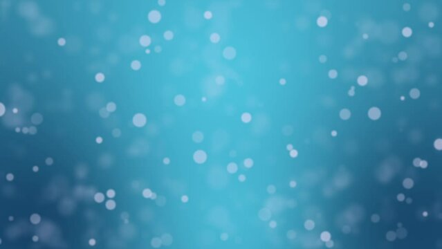 Animated teal blue bokeh background with glowing light particles