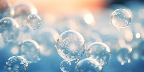 Glowing ice bubbles in close-up. Pastel soap bubbles and marbles in abstract pink and blue background wallpaper. - Powered by Adobe