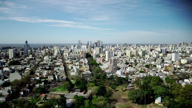 City buildings far away, copter drone aerial view.