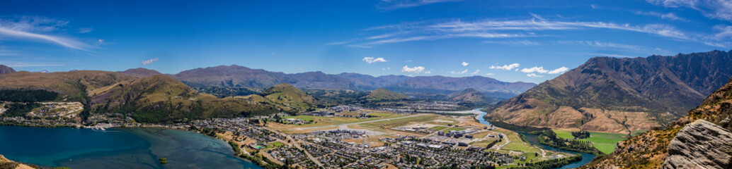The panorama view of Queenstown, Lake Wakatipu and internal national airport from  Deer Park...