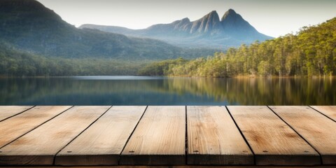 The empty wooden brown table top with blur background of Cradle mountain in Tasmania. Exuberant image. generative AI