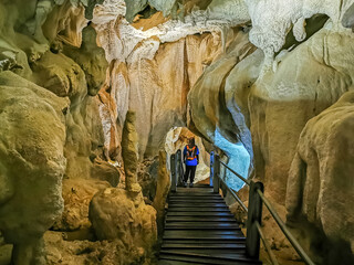 Massive chamber with plank walk trail in Clear Water Cave, Mulu National Park, Sarawak, Malaysia