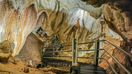 Massive chamber with plank walk trail in Clear Water Cave, Mulu National Park, Sarawak, Malaysia