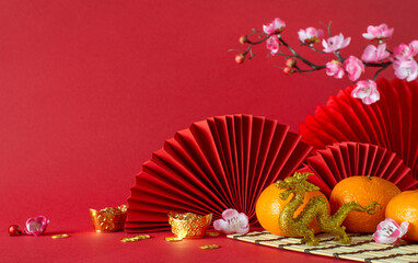 Traditional New Year tableau: side view feng shui elements, gold coins, dragon ornament,...