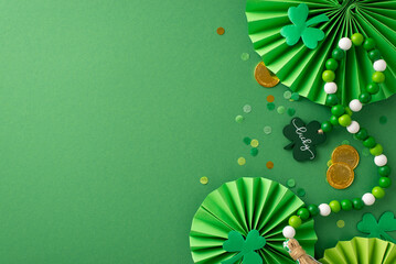 Lively celebration top view snapshot: gold coins, dynamic fans, shamrocks, confetti, and beads necklace strewn on a vibrant green surface with unoccupied space for your text or advertisement - Powered by Adobe