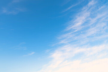 Obraz premium Blue sky with some clouds. View over the clouds light background