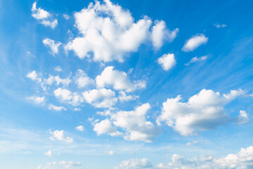 Blue sky with some clouds. View over the clouds light background