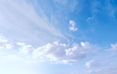 Blue sky with some clouds. View over the clouds light background