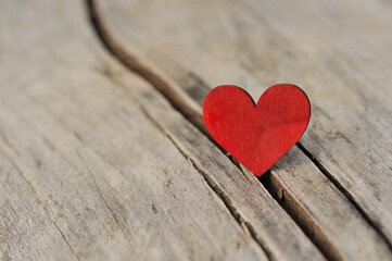 Valentines day card. Red heart on wooden background. - 702601401