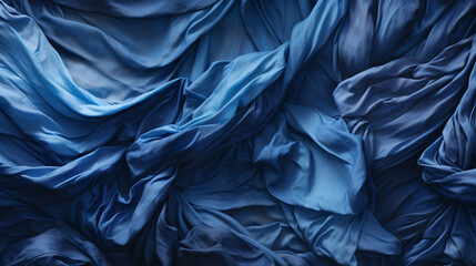 Crumpled folded blue fleece backdrop.