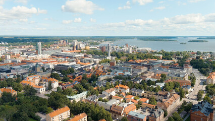 Fototapeta na wymiar Vasteras, Sweden. Panorama of the city with the town hall and Lake Malaren. Summer day, Aerial View