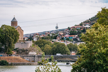 View on the Metekhi church dome, the Mtkvari river, Kala - Tbilisi Old town and the Tbilisi ropeway...