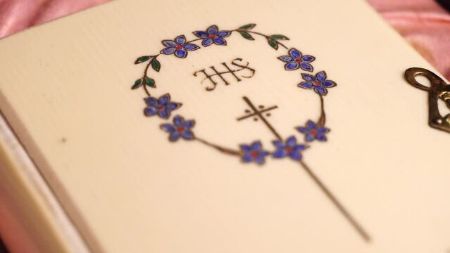 Cover of Small Praying Book in Christian Catholic Religion, Macro Close Up