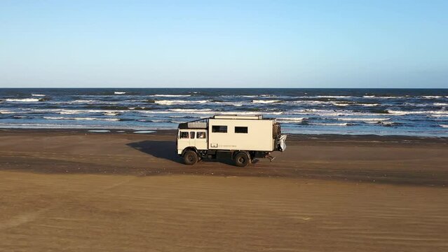 Aerial Tracking Family Riding Beach Expedition Truck RV Overlander Atlantic Ocean Brazil