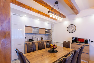 Kitchen interior and dining area in modern new mountain apartment