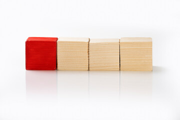 Closeup view of a row of wooden cubes