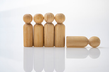 Closeup view row of wooden figure