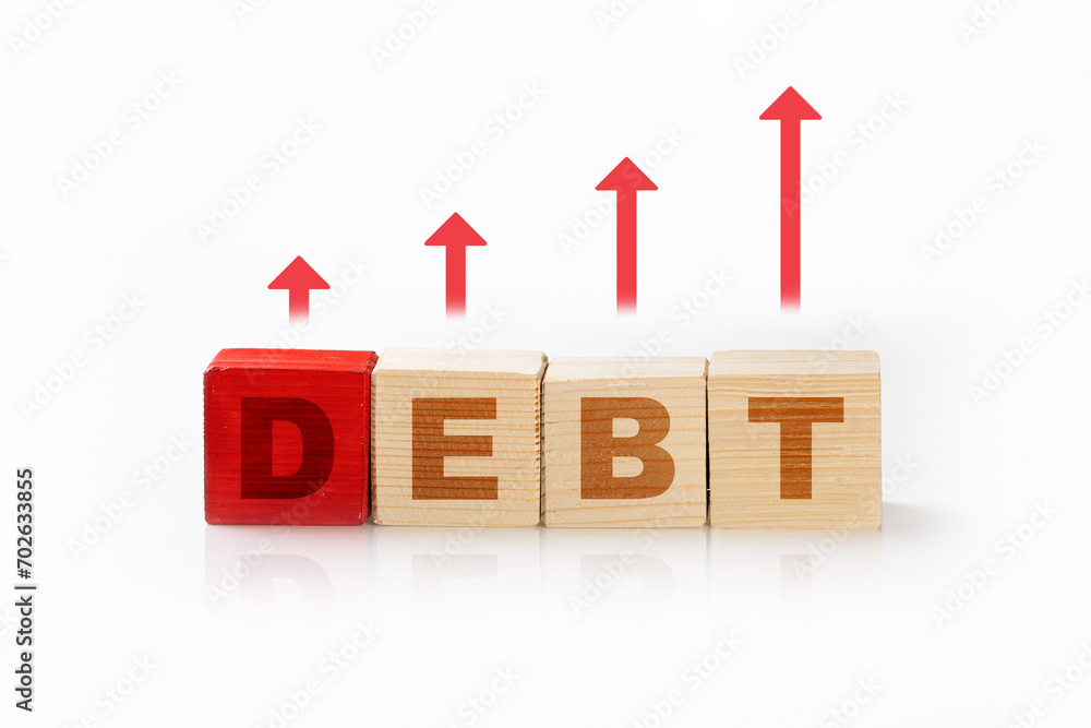 Poster closeup view of a wooden cube with debt words with the up arrow