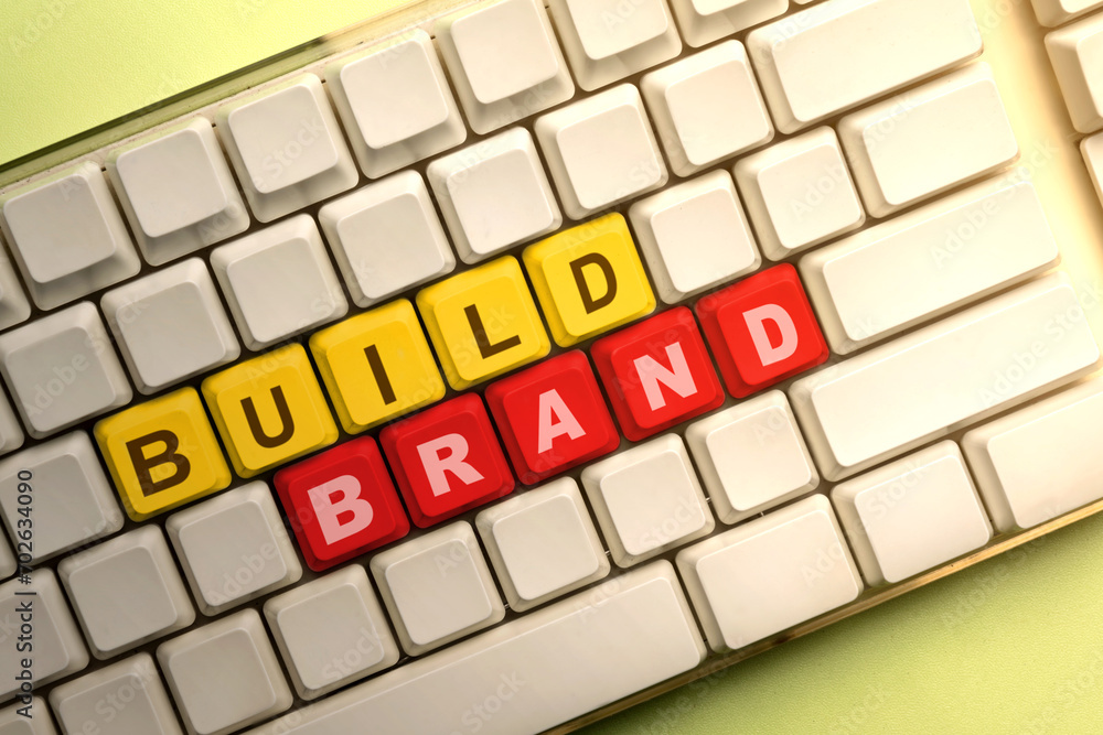Poster words of build brand on the computer keyboard button