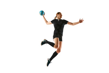 Young female handball athlete practicing throws and receptions against white background. Energetic and focused training session. Concept of professional sport, movement, dynamic, workout, championship