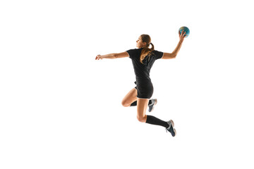 Fit young woman engaged in intense handball training, perfecting her throwing and catching abilities against white studio background. Concept of professional sport, movement, dynamic, championship. Ad - obrazy, fototapety, plakaty