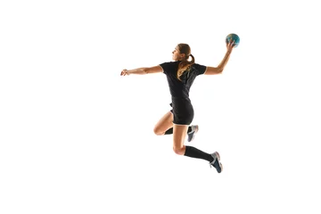 Tuinposter Fit young woman engaged in intense handball training, perfecting her throwing and catching abilities against white studio background. Concept of professional sport, movement, dynamic, championship. Ad © Lustre