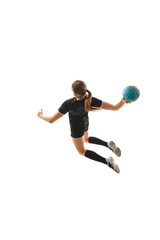 Top view portrait of skilled female handball player in motion, executing powerful throw with determination against white background. Concept of professional sport, movement, dynamic, championship.