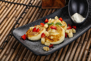 Russian cuisine curd pancake Syrniki