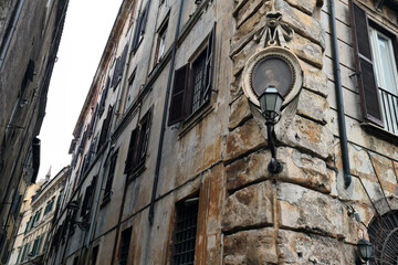 In the corner of  Via dei Coronari and Via di Monte Vecchio, Rome Italy. Beautiful old street lamp.